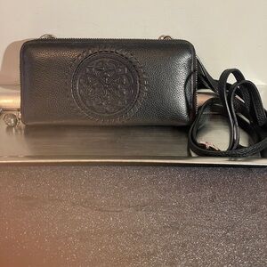 Brighton Ferrara collection. Black pebbled leather with a silver-tone medallion.